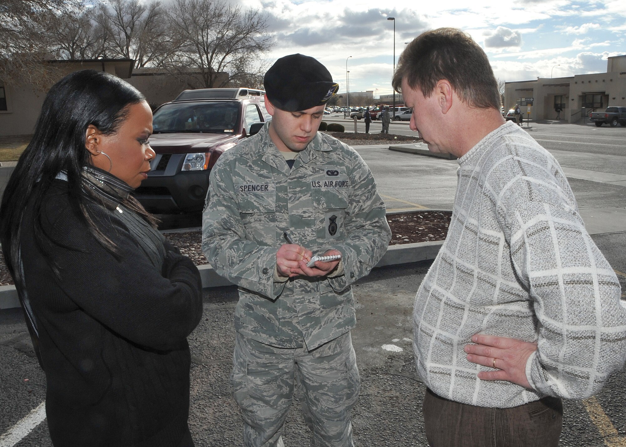 Airman 1st Class Todd Spencer, 377th Security Forces Squadron, left, takes information about a suspicious package from Martin Sibley, facility manager of the Bowling Center, during an operational readiness exercise.   
Team Kirtland participated in an exercise Jan. 24 to 28 in preparation for the Operational Readiness Inspection in March.
The exercise included various elements to prepare units for the upcoming ORI.
U.S. Air Force Photo by Todd Berenger

