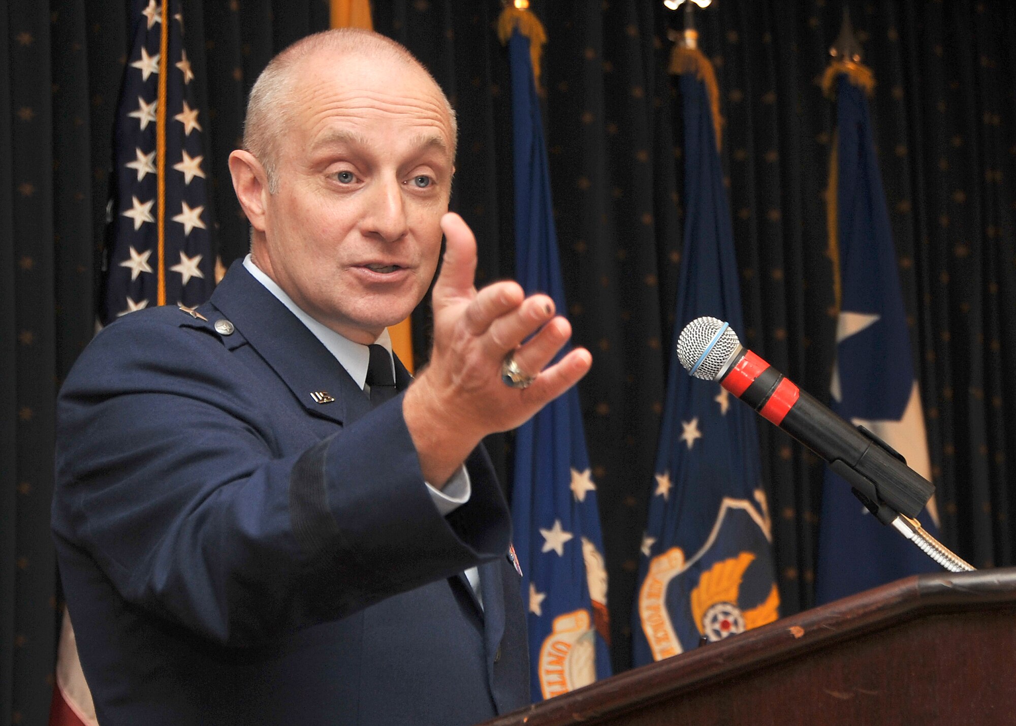 Brig. Gen. Garrett Harencak, commander of the Air Force Nuclear Weapons Center, speaks during his change of command ceremony Jan. 20 at the Mountain View Club.  U.S. Air Force Photo by Todd Berenger