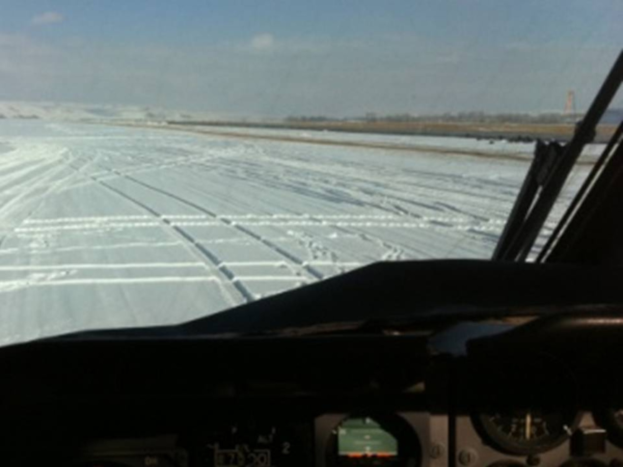 CHAKHCHARAN, Afghanistan - An Afghan Air Force C-27A Spartan transport aircraft taxis in on the high-elevation, snow covered dirt runway after helping move members of the Afghan National Army from Herat. (U.S. Air Force photo/RELEASED).
