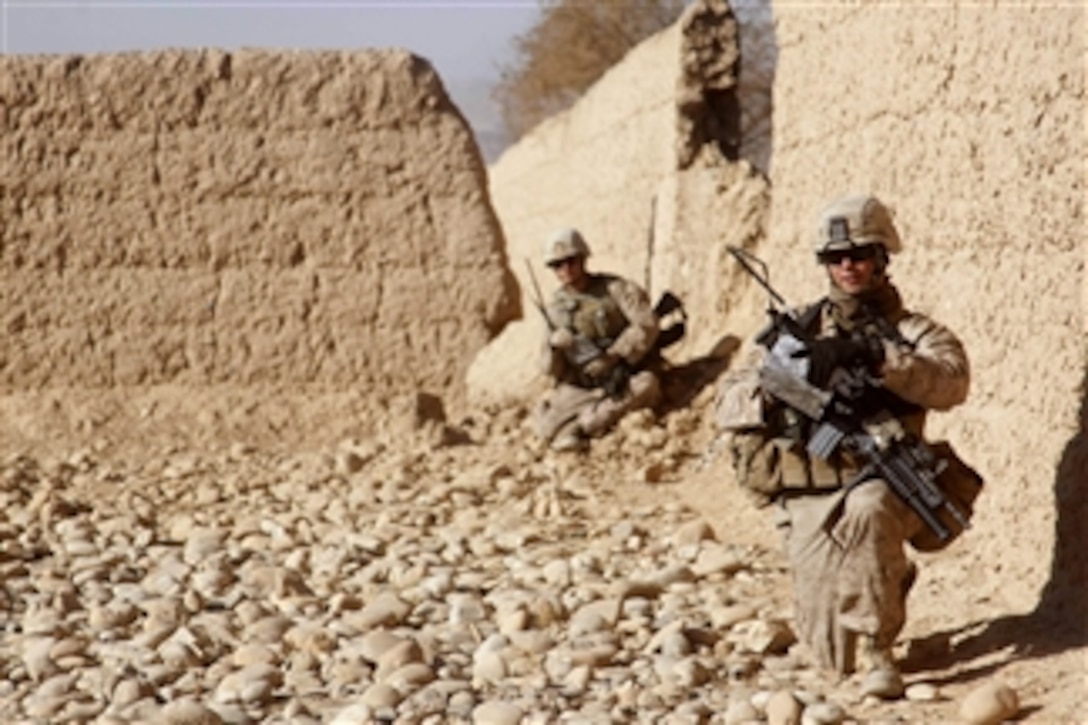 U.S. Marines and Afghan soldiers conduct a census patrol in the Sangin district of Helmand province, Afghanistan, on Jan. 18, 2011.  