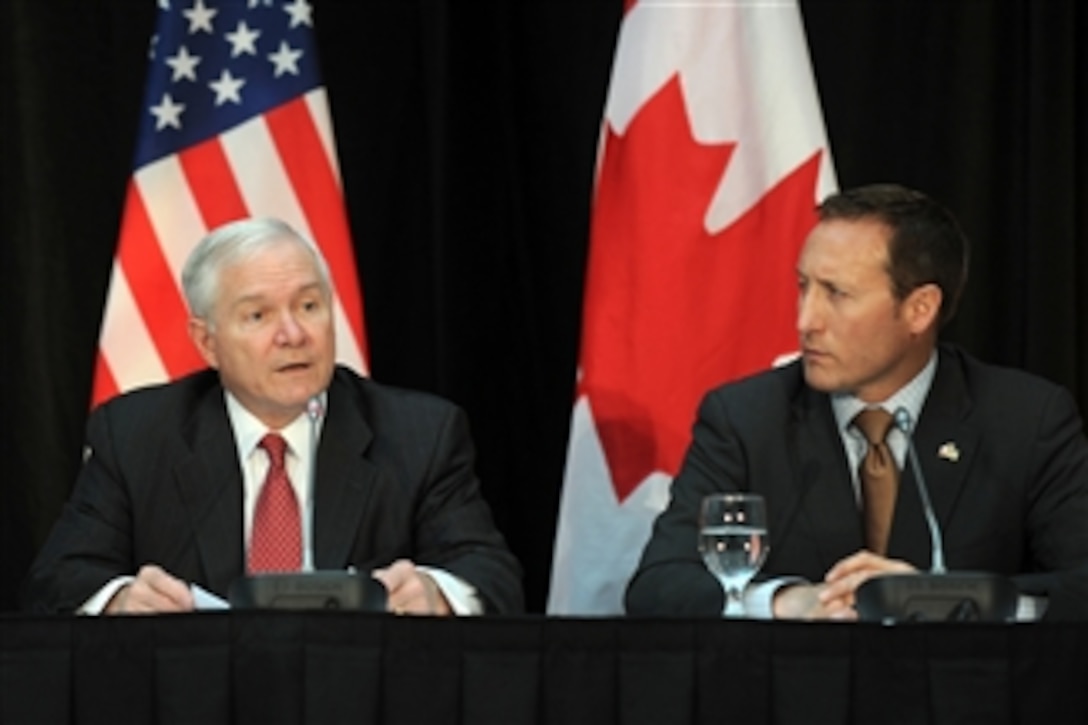 Secretary of Defense Robert M. Gates and Canadian Defense Minister Peter MacKay conduct a joint press conference at the Old City Hall in Ottawa, Canada, on Jan. 27, 2011.  Gates is in Canada to attend trilateral meetings with his counterparts from Canada and Mexico, but the Mexican Defense Minister fell ill and could not attend the meetings.  Gates and MacKay continued the discussions on topics such as Afghanistan, hemisphere issues, as well as Russia and China.  