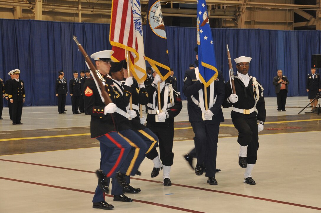 U.S. Strategic Command joint honor guard presents the colors during the change of command ceremony for U.S. Strategic Command held Jan 28, at Offutt AFB, Neb.