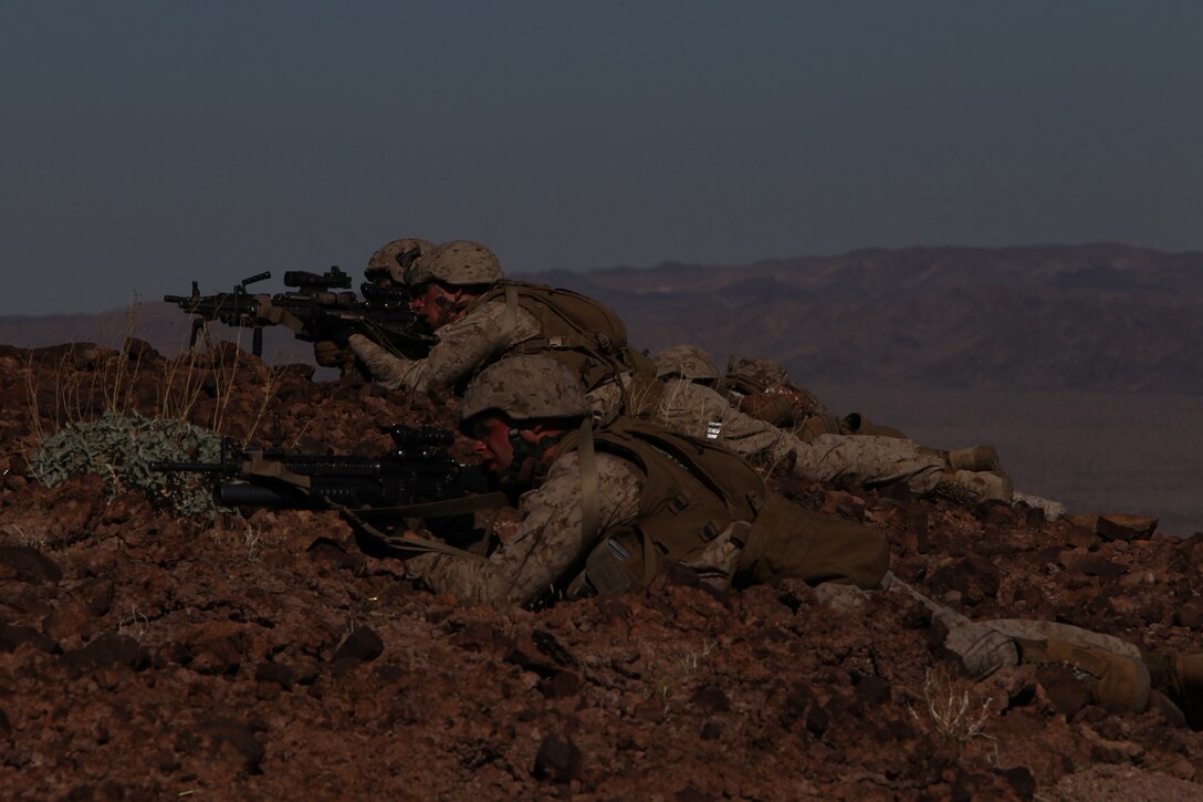 Marines with 2nd platoon, Company G, 2nd Battalion, 7th Marine Regiment, send rounds down range on an entrenched enemy position at the Lead Mountain training area Jan. 29, 2011.