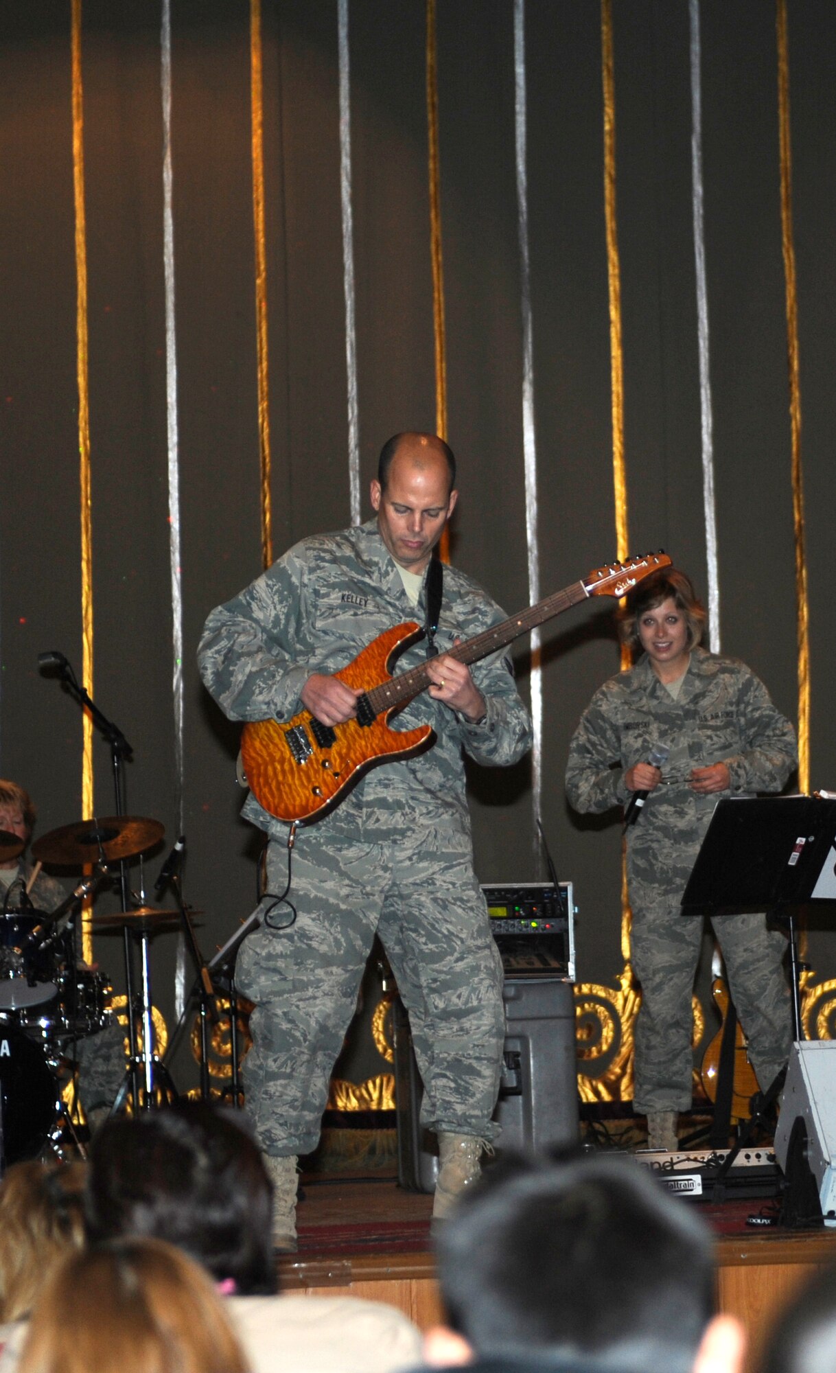 BISHKEK, Kyrgyzstan -- Master Sgt. Jerry Kelley, U.S. Air Forces Central "Starlifter" band guitarist, solos during a performance in Frunze--a  Kyrgyz military academy--in Biskek, Thursday.  The Starlifter band performed a wide variety of music for the Kyrgyz military community to enjoy. (U.S. Air Force photo/ Tech. Sgt. Jerome C. Baysmore) 
