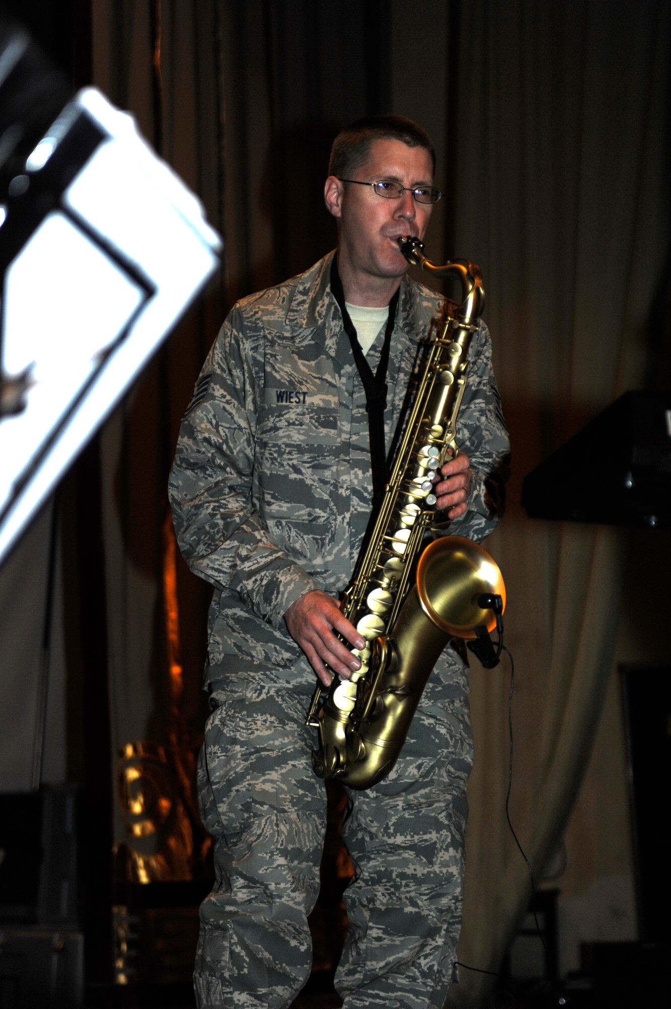 BISHKEK, Kyrgyzstan -- Tech. Sgt. Dwight Wiest, U.S. Air Forces Central "Starlifter" band saxophonist, rocks during a performance in Frunze--a  Kyrgyz military academy--in Biskek, Thursday.  The Starlifter band performed a wide variety of music for the Kyrgyz military community to enjoy. (U.S. Air Force photo/ Tech. Sgt. Jerome C. Baysmore) 
