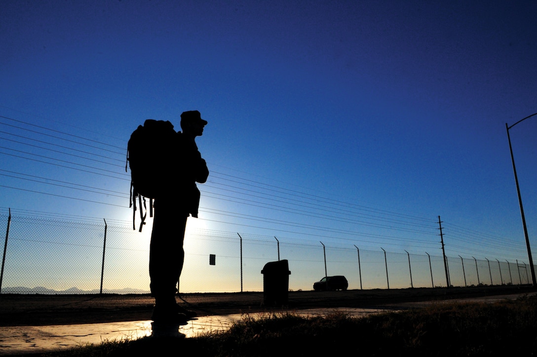 Lance Cpl. Jacob Fansler, installation personnel and administration center separations clerk, pauses during an individual workup hike Jan. 29, 2011, at Meyers Park on the Marine Corps Air Station in Yuma, Ariz., for the Bataan Memorial Death March at the White Sands Missile Range, N.M., on March 27, 2011. The annual event, in its 22nd year, is held as tribute to the service members who lost their lives during World War II when they were forced by the Japanese to march the Bataan Peninsula in the Philippines. “It’s in memory of all the soldiers, Marines and military personnel who died. Going out there, it’s a tribute to them,” said Fansler. Another 10 IPAC Marines are expected to attend this year, making it the third year IPAC has been represented by a group.