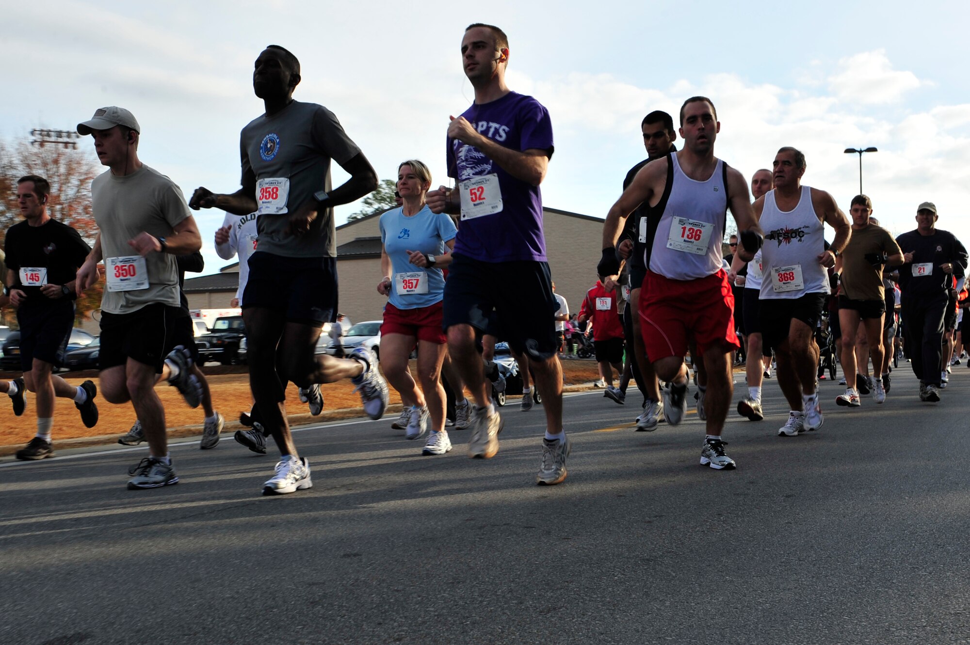 U.S. Air Force members and their families run a 5K or 14K in honor of Spirit 03, Hurlburt Field, Fla., Jan. 30, 2011. The run was the first of a series of events scheduled to pay tribute to the fallen crew of Spirit 03, an AC-130H Spectre Gunship lost during Desert Storm. (U.S. Air Force photo by Staff Sgt. Stephanie Jacobs/RELEASED)