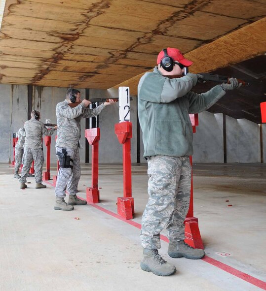 Five combat arms instructors from the 2nd Security Forces Squadron re-qualify on the M870 Shotgun at Barksdale Air Force Base, La., Jan. 31. Each instructor fires five rounds for practice and five rounds for qualifying. To qualify with the shotgun, 25 hits need to make it on the target sheet. (U.S. Air Force photo/Senior Airman Alexandra M. Boutte) (RELEASED)