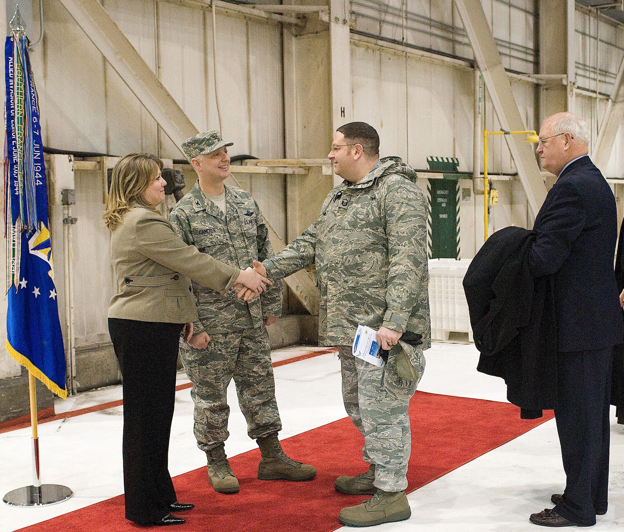 Col. Mark Camerer and his wife, Julie, welcome people to a reception after the 436th Airlift Wing change of command ceremony Jan. 27, 2011.  (U.S. Air Force photo/Jason Minto)