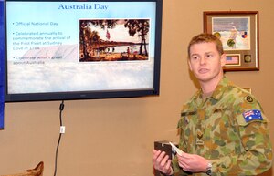 Cpl. Craig Hollindale, Royal Australian Air Force, talks to the men and women of the 480th Intelligence, Surveillance and Reconnaissance Wing, Langley Air Force Base, Va., about the history and importance of “Australia Day”, the official national holiday of Australia.  Corporal Hollindale is attached to the 497th ISR Group as part of an orientation program. (U. S. Air Force photo/Staff Sgt. Logan Tuttle) 