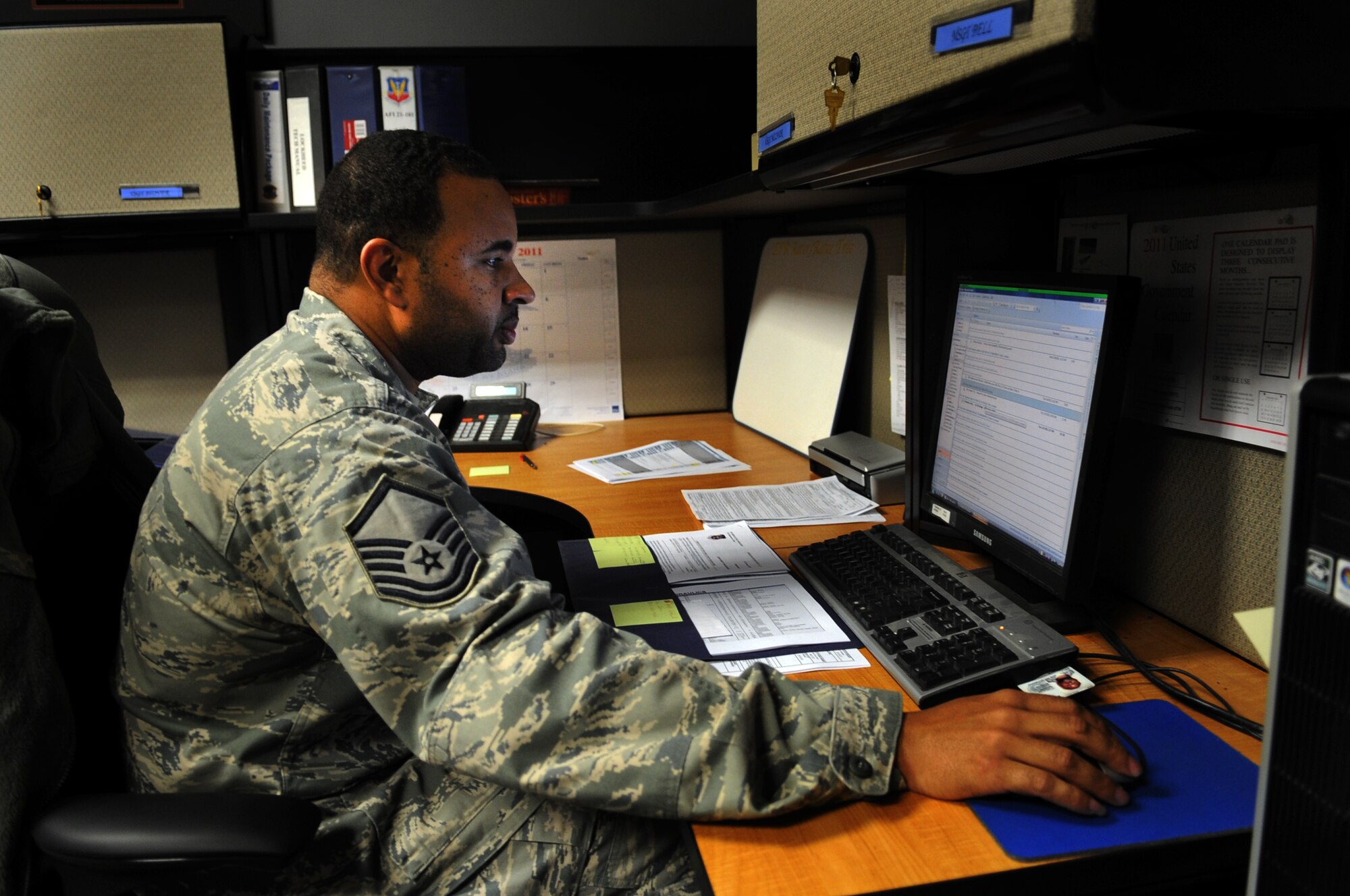 MOODY AIR FORCE BASE, Ga. -- Master Sgt. Torrance Bell, 71st Aircraft Maintenance Unit superintendent, reviews a flying schedule Jan. 26. Sergeant Bell is tasked to ensure that aircraft are in the air in accordance to the flying schedule. (U.S. Air Force photo/Airman 1st Class Douglas Ellis)(RELEASED)
