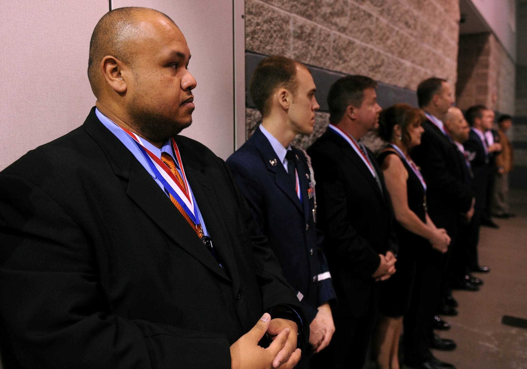 VALDOSTA, Ga.-- Del Philpot, 23rd Wing annual award nominee, stands in line with the rest of the evening’s winners at the Annual Awards Banquet Jan. 29. A standing ovation was given to the award winners at the end of the banquet. (U.S. Air Force photo/Airman 1st Class Benjamin Wiseman)(RELEASED)