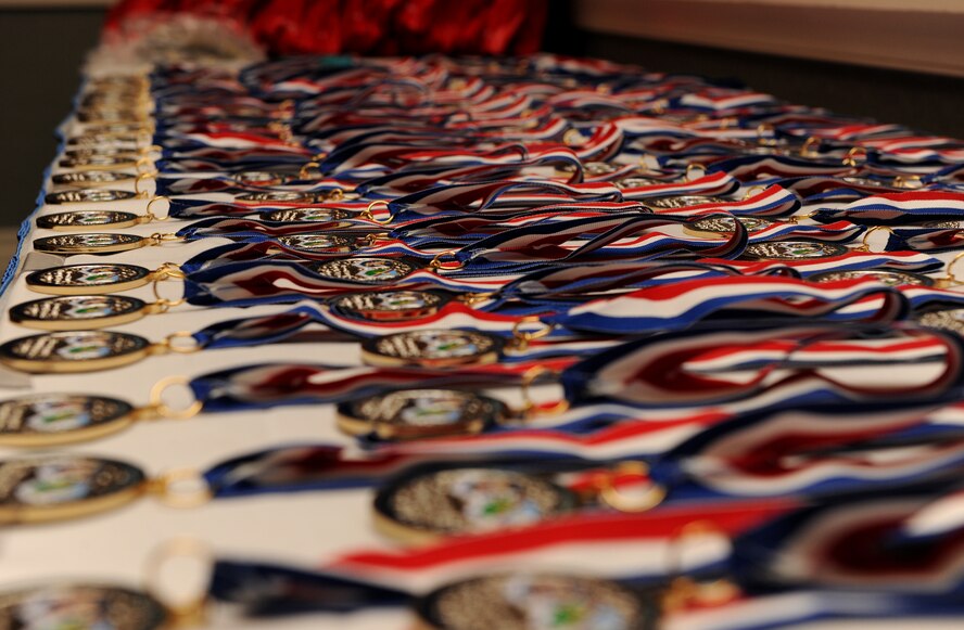 VALDOSTA, Ga.-- Medallions rest on a table as the commanders of the 23rd Wing and 93rd Air Ground Operations Wing present each award nominee with a medallion during the Annual Awards Banquet at the James H. Rainwater Conference Center Jan. 29. There were nearly 90 nominees for the 2010 annual awards. (U.S. Air Force photo/Airman 1st Class Benjamin Wiseman)(RELEASED)