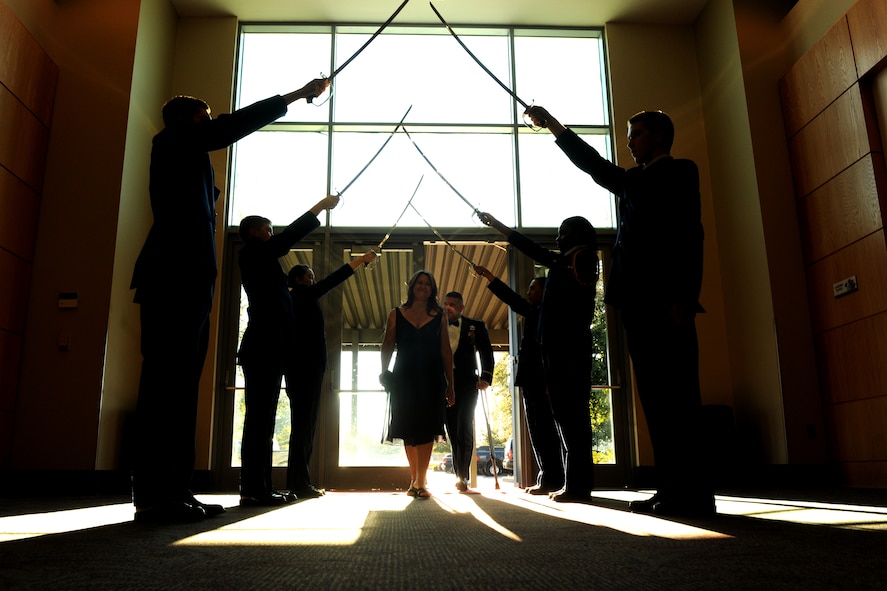 VALDOSTA, Ga.-- Cadets from the Valdosta State University Air Force ROTC Detachment 172 conduct a saber detail as Col. Randall Richert, 820th Base Defense Group commander, and wife, Andrea, enter the Annual Awards Banquet at the James H. Rainwater Conference Center Jan. 29. Several group and squadron commanders came to support their Airmen during the awards ceremony. (U.S. Air Force photo/Airman 1st Class Benjamin Wiseman)(RELEASED)
