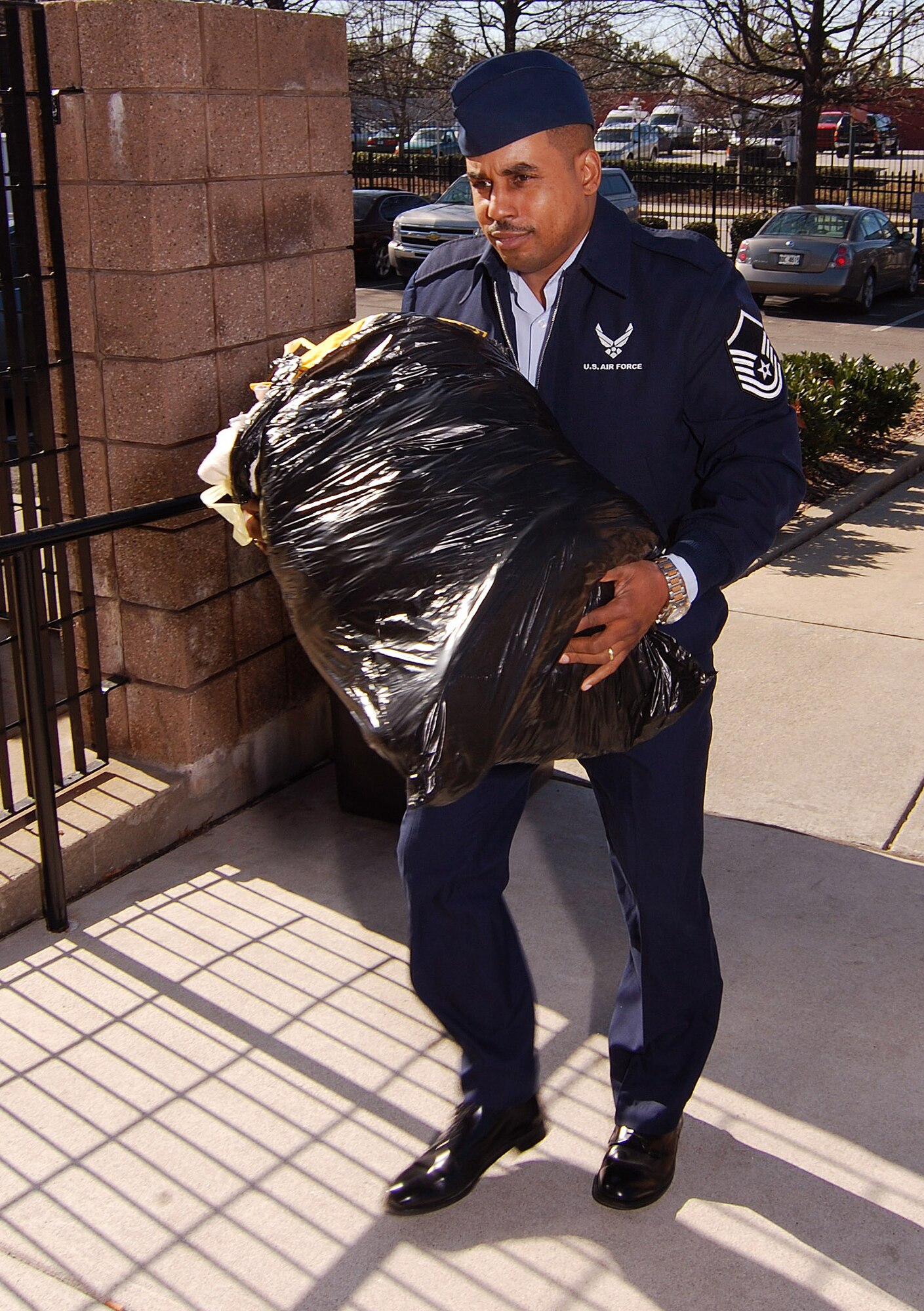Master Sgt. Murray Taylor, visiting from the  914th Airlift Wing, Niagara Falls Air Reserve Station, N.Y., helps bring in clothing donated to the Atlanta Salvation Army by personnel of the 94th Airlift Wing, Dobbins Air Reserve Base, Ga., Jan 24.  The items collected during the first-ever Dobbins Human Resource Development Council food and clothing drive were part of an overall donation to multiple area charities.  (U.S. Air Force photo/ Brad Fallin)