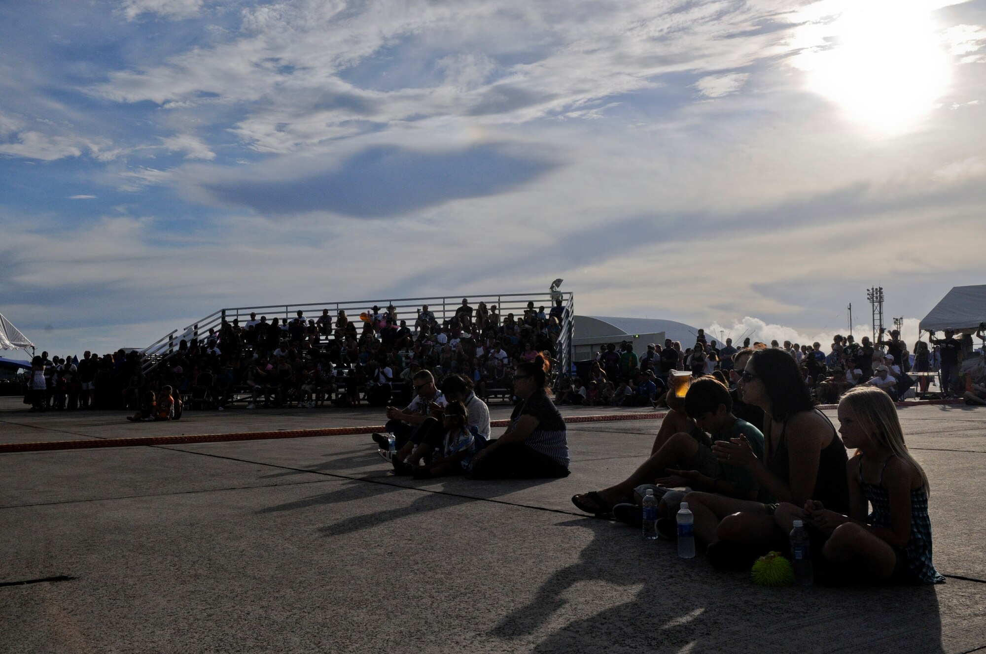 A crowd watches the T-DA hip hop dancers perform at AmericaFest on KadenaAir Base, Japan, July 1. AmericaFest included a variety of rides, games, static aircraft displays and live, on-stage performances ranging from local artists and dancers to rock band, 12 Stones and country-pop singer Jessie James. (U.S.Air Force photo/ Airman 1st Class Maeson L. Elleman)