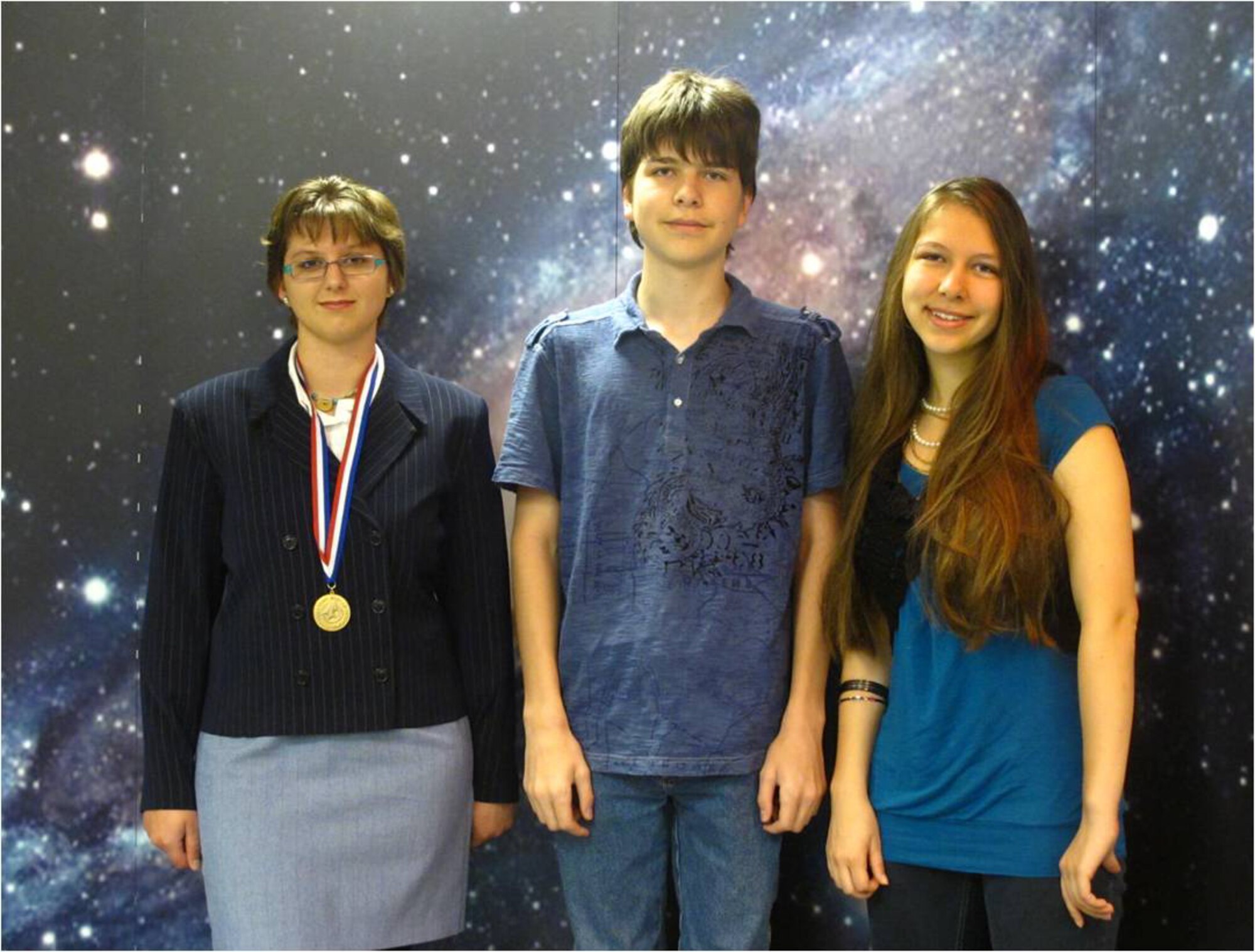 Former AFRL La Luz Academy student participants, from left, Lana Kimmel, Jack Hanson and Haley Hanson, were recognized for their achievements while participating in a variety of national academic competitions. Courtesy Photo by Steve Burke