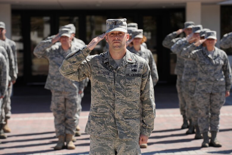 VANDENBERG AIR FORCE BASE, Calif. -- 2nd Lt. Brandon Jacobson, a 30th Comptroller Sqaudron member, salutes during a retreat ceremony at the headquarters building here Thursday, June 30, 2011.  Members of the Wing Staff Agencies participated in the ceremony. (U.S. Air Force photo/Staff Sgt. Andrew Satran) 