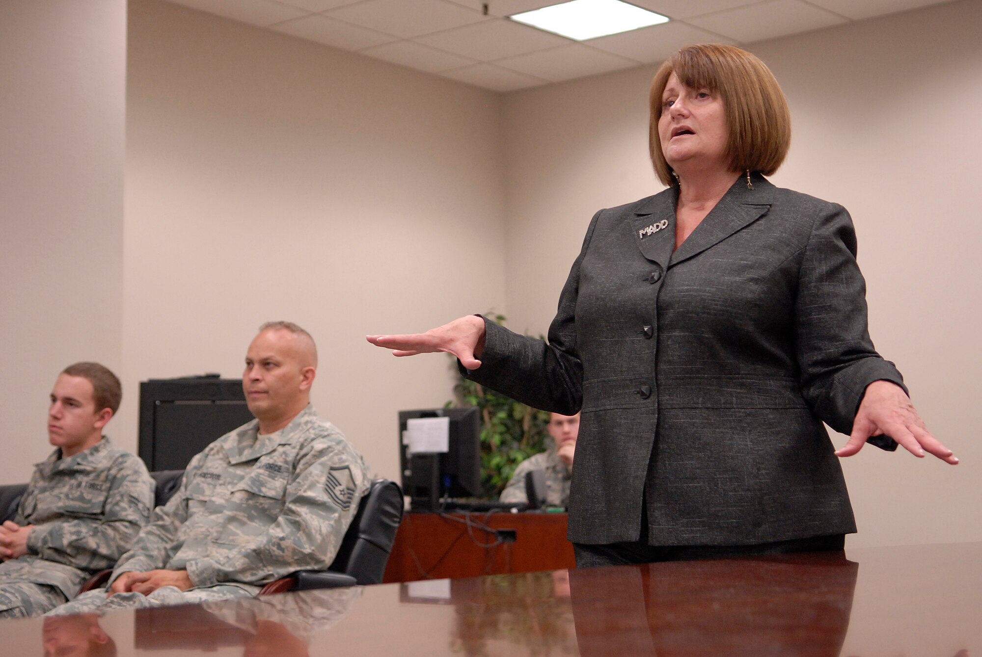 Tina Pasco, a representative from Mothers Against Drunk Driving, speaks to members of the 30th Operations Group here Thursday, June 30, 2011. Ms. Pasco briefed servicemembers about the dangers of drinking and driving. (U.S. Air Force photo/ Jennifer Green-Lanchoney)