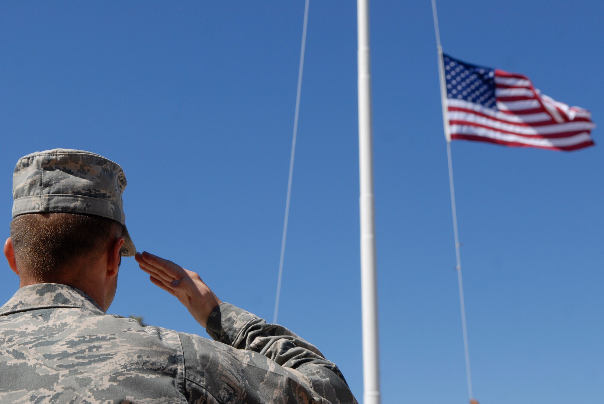 VANDENBERG AIR FORCE BASE, Calif. -- 2nd Lt. Brandon Jacobson, a 30th Comptroller Squadron member, salutes during a retreat ceremony at the headquarters building here Thursday, June 30, 2011.  Members of the Wing Staff Agencies participated in the ceremony.   (U.S. Air Force photo/Staff Sgt. Andrew Satran) 

 