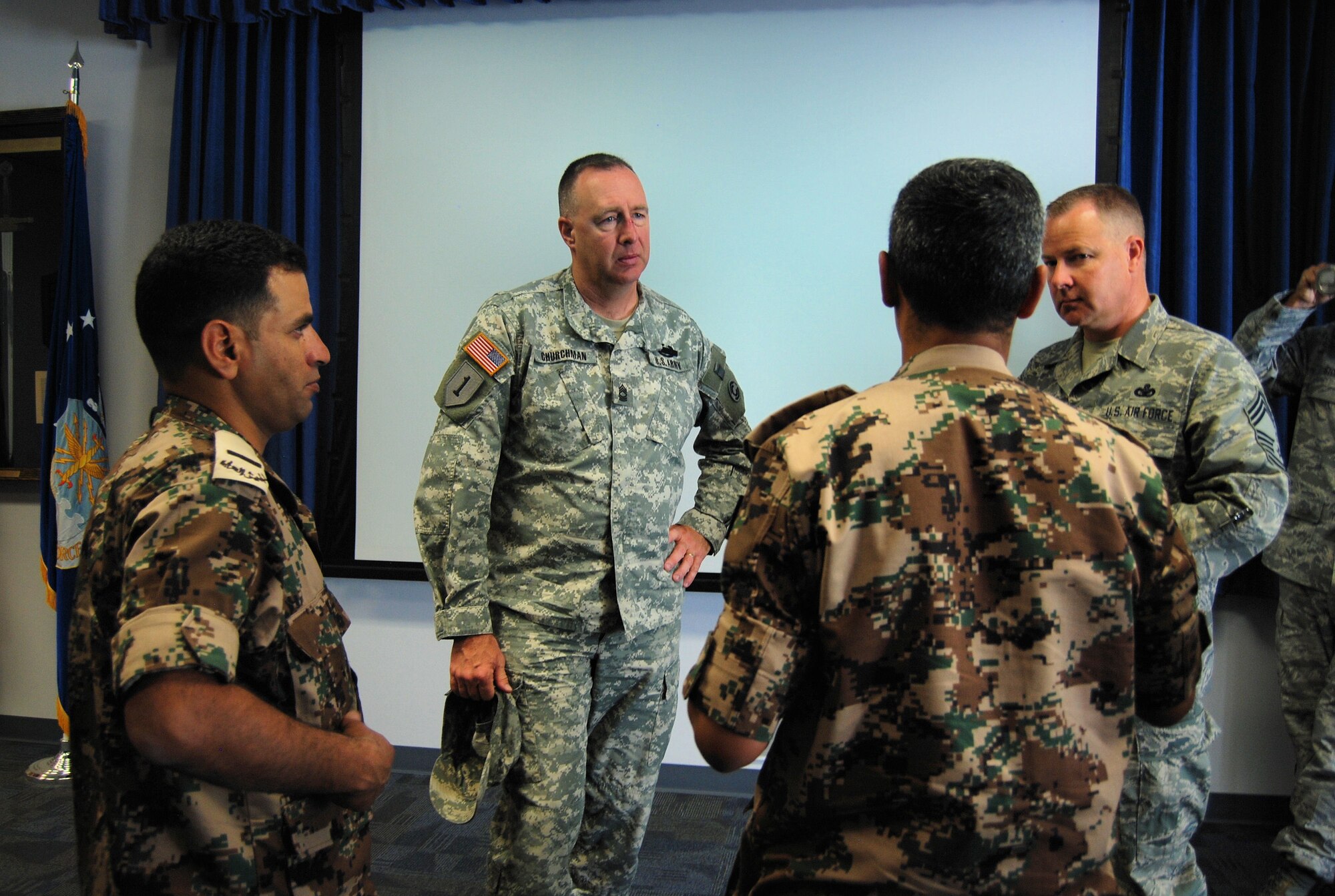 Army Master Sgt. Dan Churchman talks with top enlisted leaders of the Jordanian army June 24, 2011, during a briefing at the Forrest L. Vosler NCO Academy about the differences in enlisted training of U.S. forces. (Air Force photo/Airman 1st Class Jessica Hines)