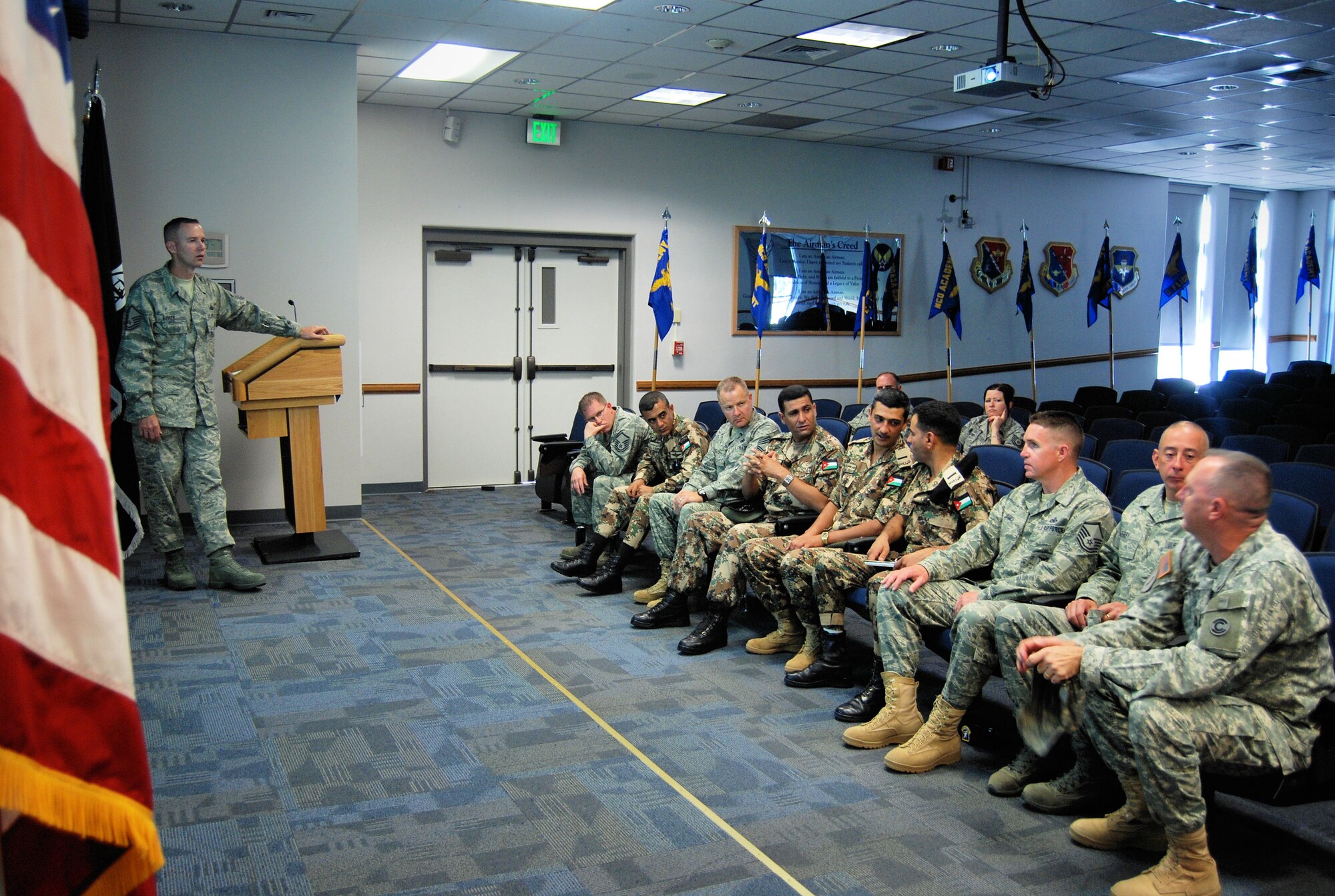 Top enlisted leaders of the Jordanian army and senior noncommissioned officers from the Forrest L. Vosler NCO Academy and Fort Carson have discussions during a presentation on enlisted training in the Air Force June 24, 2011, at the NCOA on Peterson Air Force Base. (Air Force photo/Airman 1st Class Jessica Hines) 