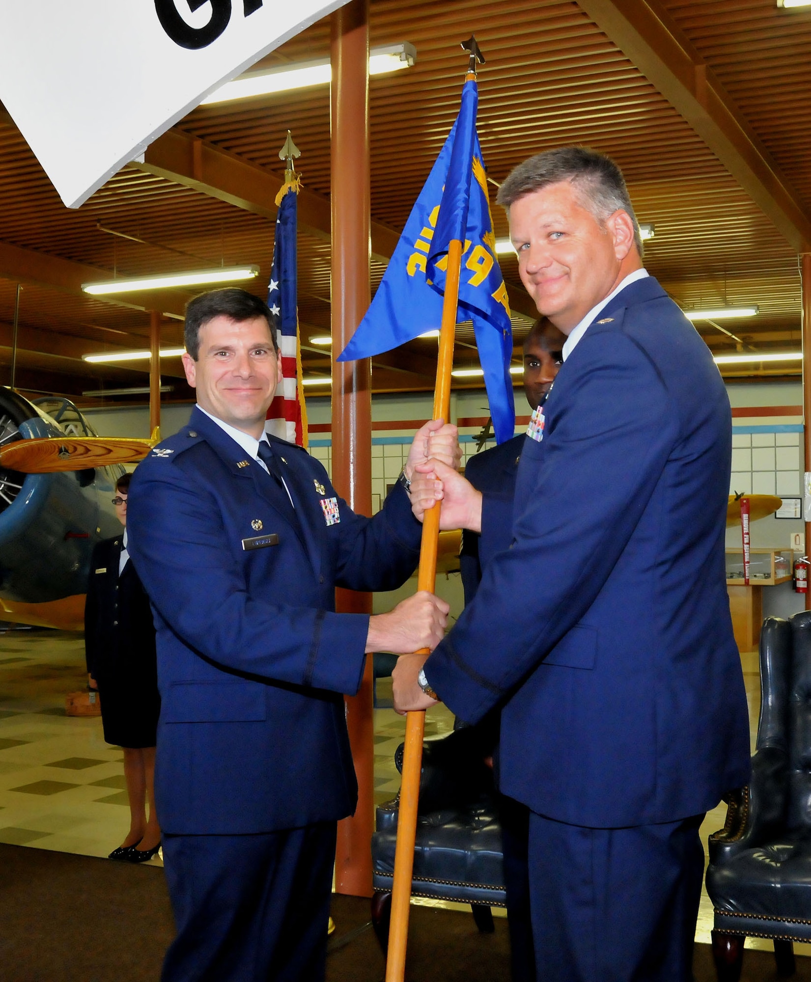 TRAVIS AIR FORCE BASE, Calif. -- With the traditional passing of the squadron flag, Lt. Col. Eric Jenkins became the new commander of  the 79th Air Refueling Squadron June 26, 2011. (U.S. Air Force photo/Master Sgt. Robert Wade)