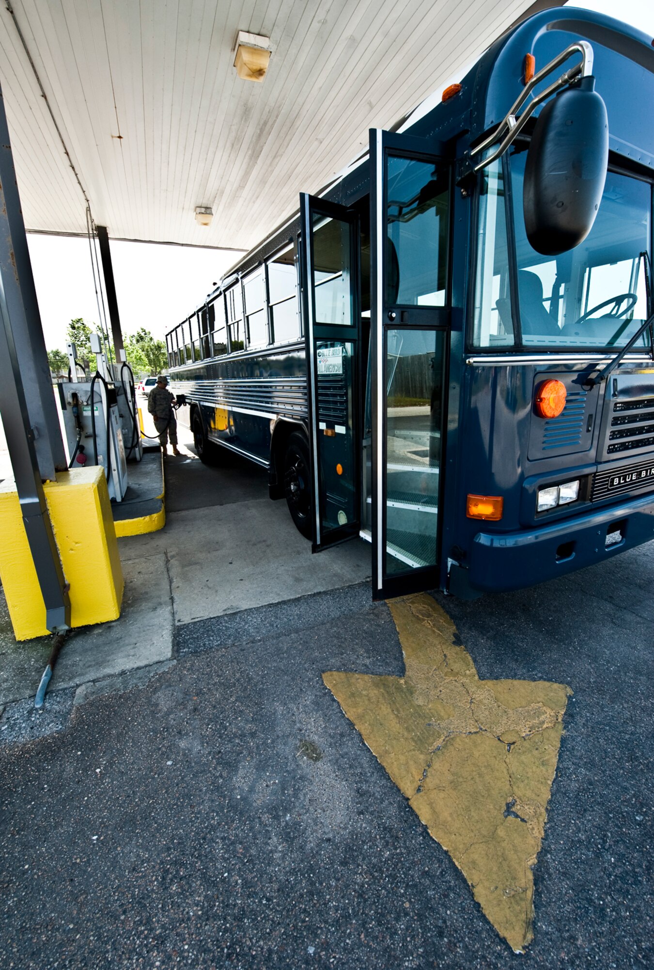 Senior Airman Michelle Wamsley, 96th Logistics Readiness Squadron vehicle operations, refuels the bus before returning it to the vehicle lot on Eglin.  Vehicle operations Airmen are responsible for all passenger movement using military buses on base.  Larger vehicles like buses also receive the same thorough inspection “check-out” vehicles go through.  The Airmen of vehicle operations are responsible for driving, upkeep, dispatching and delivery of more than 130 vehicles on base.   The vehicle operations flight managed more than 13 thousand transportation requests last year.  (U.S. Air Force photo/Samuel King Jr.) 