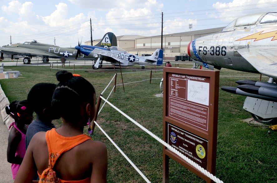 Brother and sisters, Tiara, 9, Roman Jr., 7, and Camille Proctor, 4, look at the F-84F "Thunderstreak", while visiting the Eighth Air Force Museum Airpark on Barksdale Air Force Base, La., June 29. The airpark is only half of what the museum has to offer, more history of aerial bombardment is inside, including events prior to WW II. The museum is open from 9:30 a.m. to 4 p.m. daily. (U.S. Air Force Photo/Senior Airman La'Shanette V. Garrett)(RELEASED) 