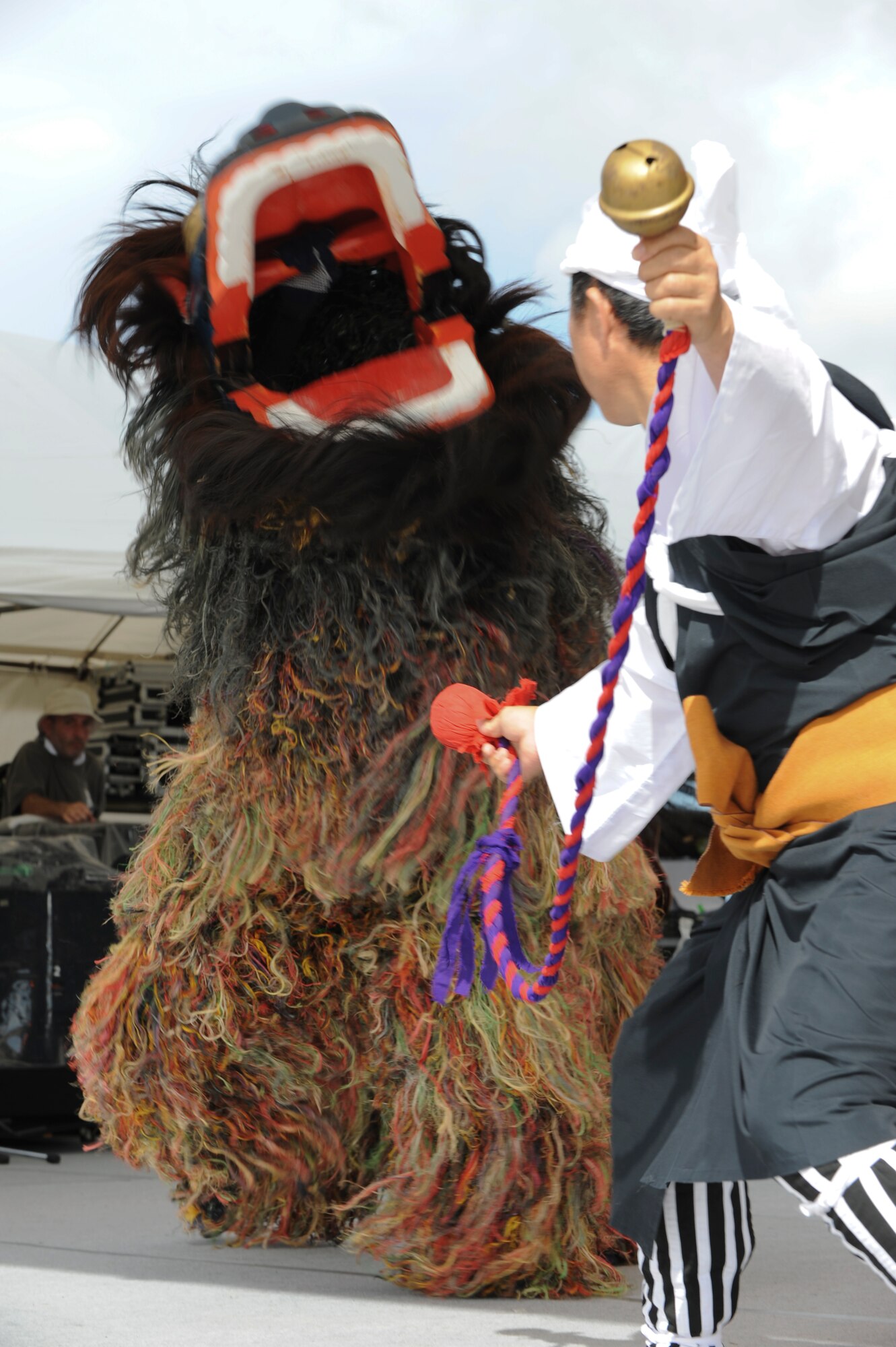 The Shi-Shi Dogs perform live at Kadena’s America Fest, Kadena Air Base, Japan, July 1. The Shi-Shi Dogs performed historical Okinawan dance. AmericaFest is a chance to celebrate Independence Day and share the celebration with our Japanese counterparts. Food, games and musical entertainment were also provided. (U.S. Air Force photo/Airman 1st Class Brooke P. Beers)