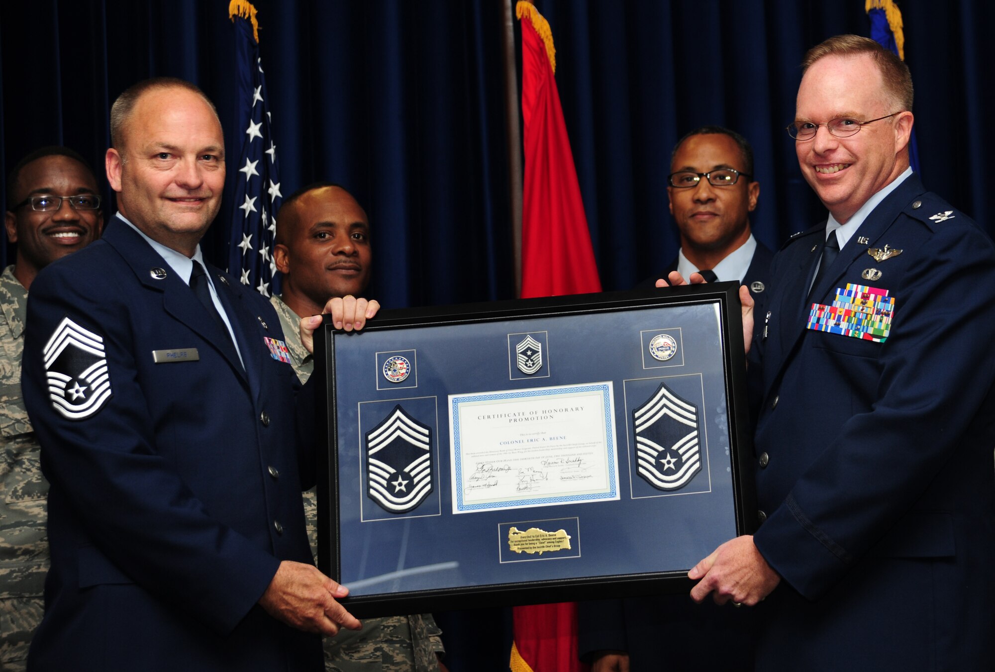 Col. Eric Beene, 39th Air Base Wing commander, receives an honorary promotion to chief master sergeant by the Chiefs’ Group June 30, 2011, at the Club Complex Ballroom at Incirlik Air Base, Turkey. (U.S. Air Force photo by Senior Airman Anthony Sanchelli/Released)