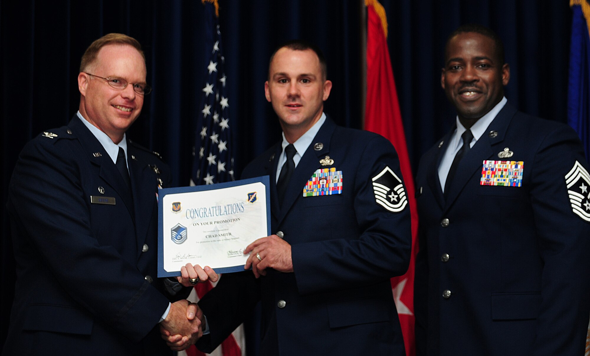 Chad Smith, 39th Logistics Readiness Squadron, is promoted to the rank of master sergeant June 30, 2011, at the Club Complex Ballroom at Incirlik Air Base, Turkey. (U.S. Air Force photo by Senior Airman Anthony Sanchelli/Released)