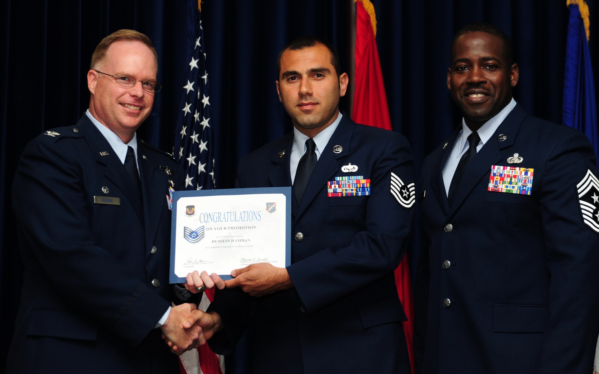 Hussein Hamdan, 39th Force Support Squadron, is promoted to the rank of technical sergeant June 30, 2011, at the Club Complex Ballroom at Incirlik Air Base, Turkey. (U.S. Air Force photo by Senior Airman Anthony Sanchelli/Released)