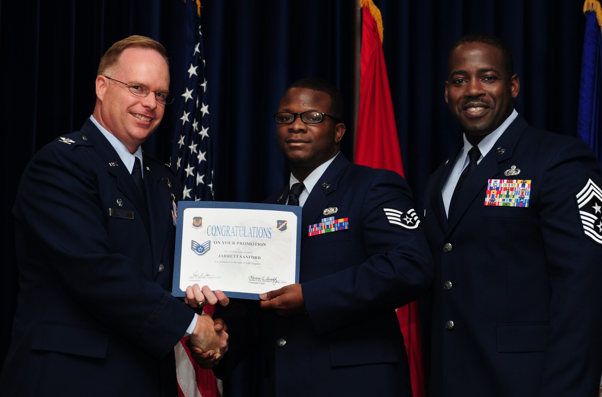 Jarrett Sanford, 39th Logistics Readiness Squadron, is promoted to the rank of staff sergeant June 30, 2011, at the Club Complex Ballroom at Incirlik Air Base, Turkey. (U.S. Air Force photo by Senior Airman Anthony Sanchelli/Released)