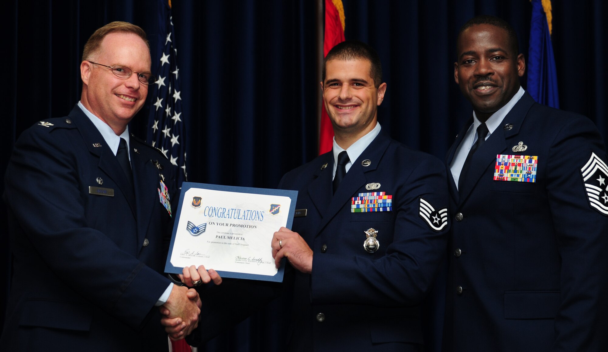 Paul Melicia, 39th Security Forces Squadron, is promoted to the rank of staff sergeant June 30, 2011, at the Club Complex Ballroom at Incirlik Air Base, Turkey. (U.S. Air Force photo by Senior Airman Anthony Sanchelli/Released)