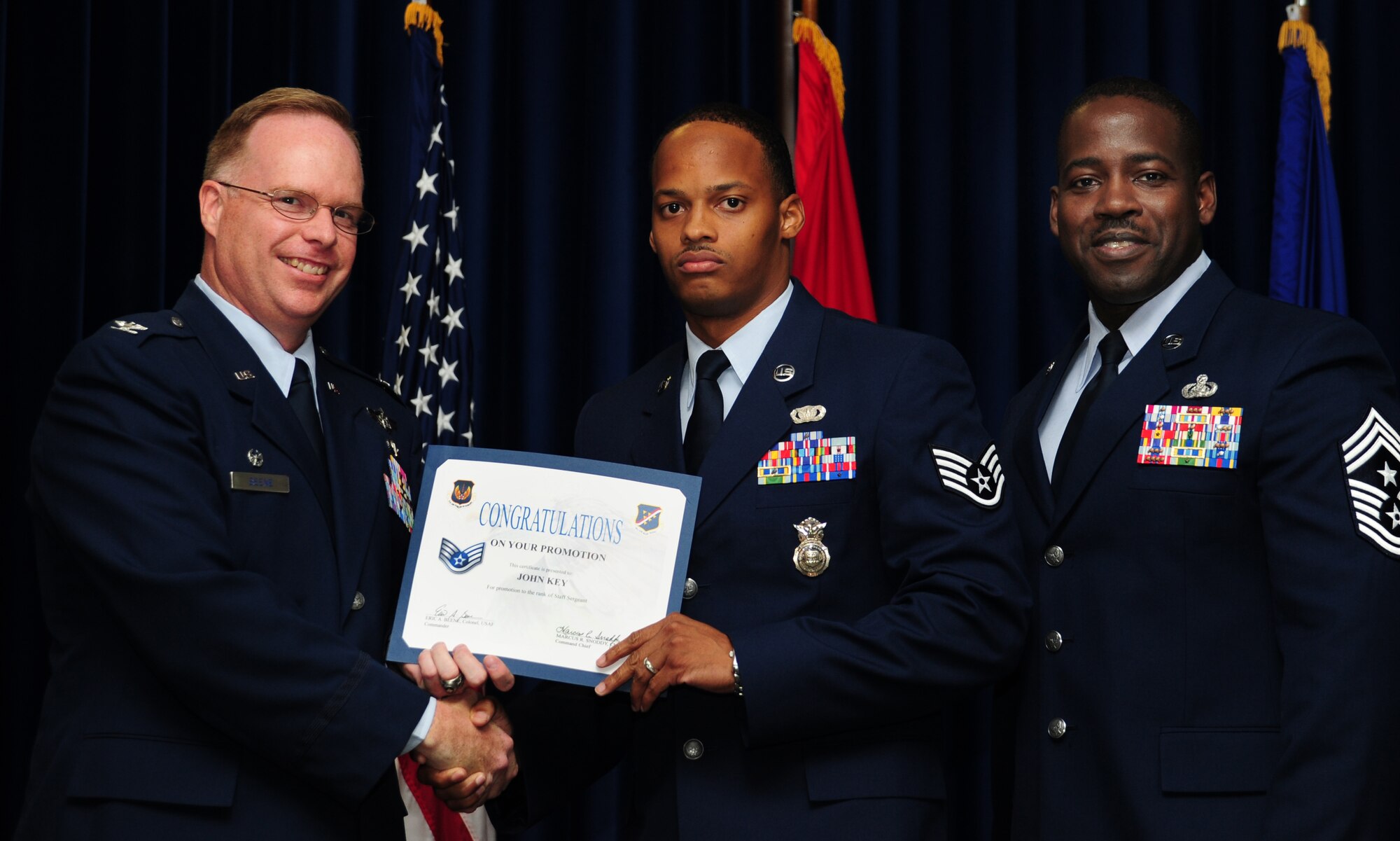 John Key, 39th Security Forces Squadron, is promoted to the rank of staff sergeant June 30, 2011, at the Club Complex Ballroom at Incirlik Air Base, Turkey. (U.S. Air Force photo by Senior Airman Anthony Sanchelli/Released)