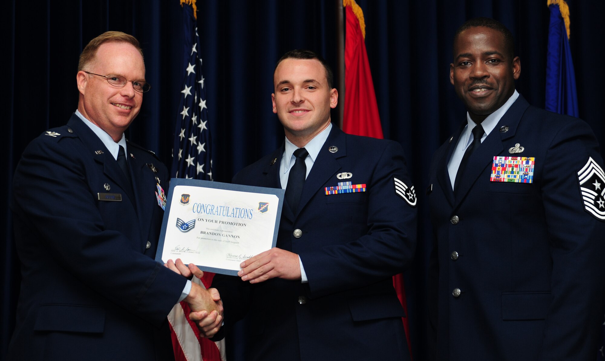 Brandon Gannon, 728th Air Mobility Squadron, is promoted to the rank of staff sergeant June 30, 2011, at the Club Complex Ballroom at Incirlik Air Base, Turkey. (U.S. Air Force photo by Senior Airman Anthony Sanchelli/Released)