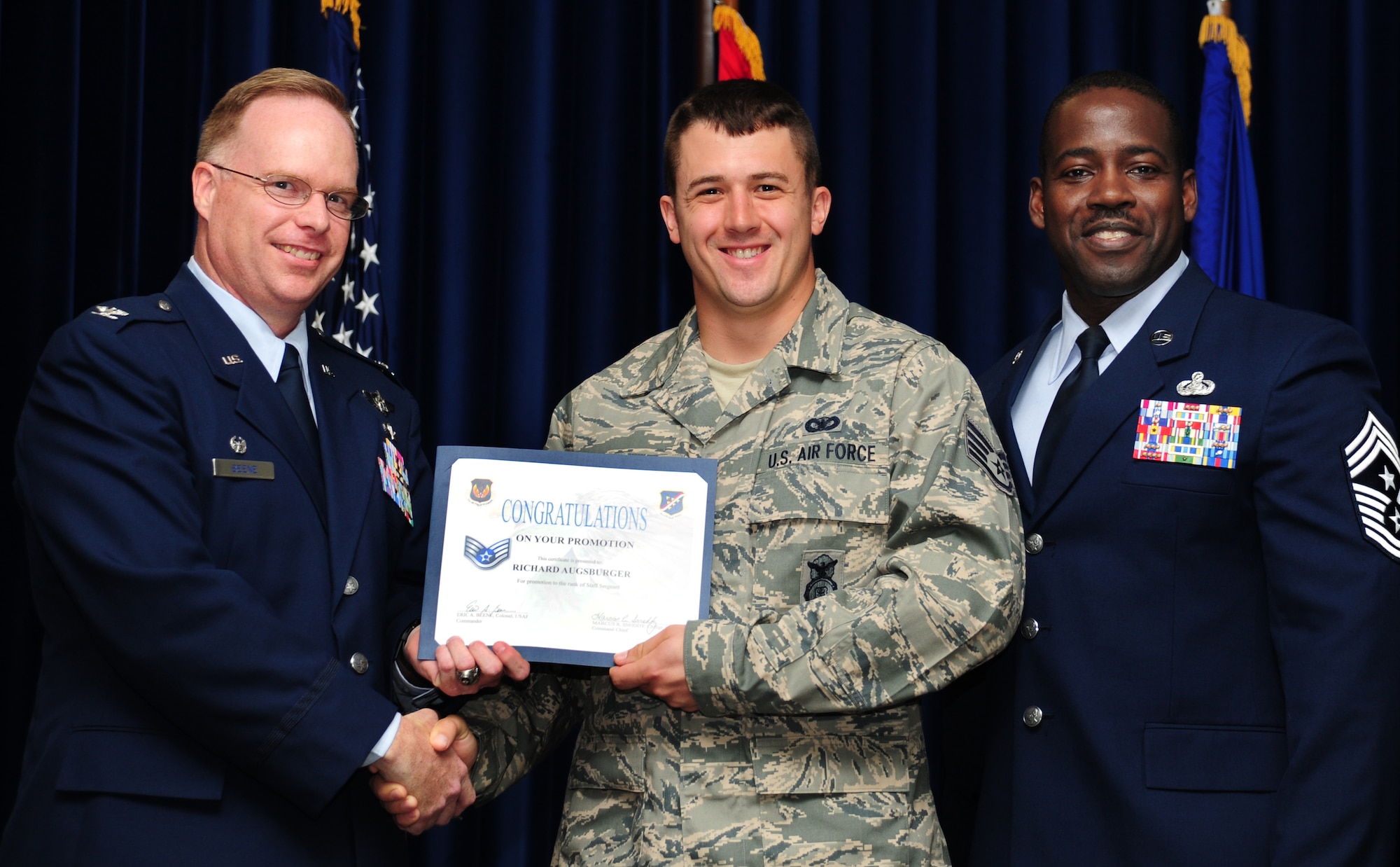 Richard Augsburger, 39th Security Forces Squadron, is promoted to the rank of staff sergeant June 30, 2011, at the Club Complex Ballroom at Incirlik Air Base, Turkey. (U.S. Air Force photo by Senior Airman Anthony Sanchelli/Released)