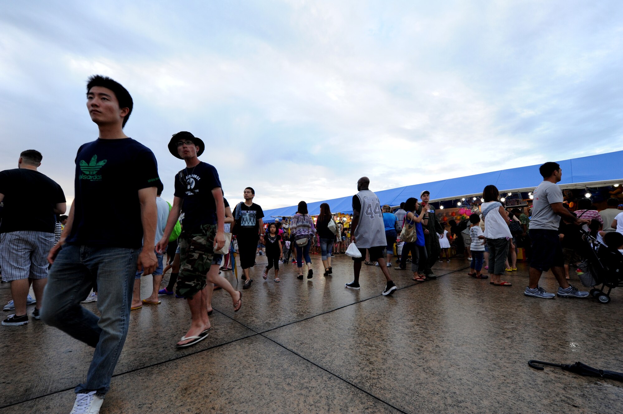 Members from the local community, as well as, U.S service members enjoy the festivities during AmericaFest 2011 at Kadena Air Base, Japan, July 2. AmericaFest takes place July 1 and 2, and is an event designed to build international relations with the local Okinawan community. (U.S. Air Force photo/Airman 1st Class Jarvie Z. Wallace)
