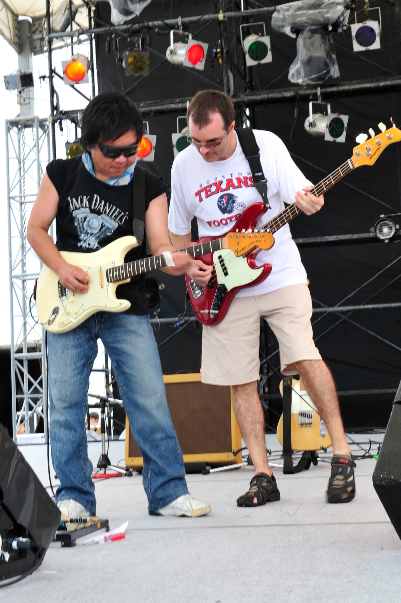Storm Watch, a rock and roll band, performs for members of Team Kadena and the local community during the annual America Fest at Kadena Air Base, June 2.  America Fest is an annual tradition held in honor of our Independence Day. (U.S. Air Force photo/Staff Sgt. Lakisha A. Croley)