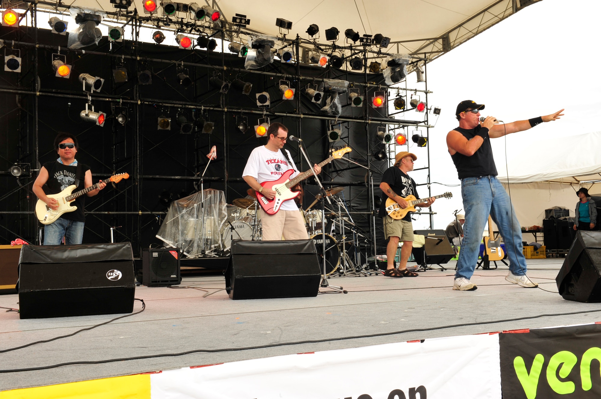 The rock band Storm Watch performs for members of Team Kadena and the local community during the annual America Fest at Kadena Air Base, June2.  Kadena AB opened its gates to the local community in celebration of the America's 235th birthday. (U.S. Air Force photo/Staff Sgt. Lakisha A. Croley)