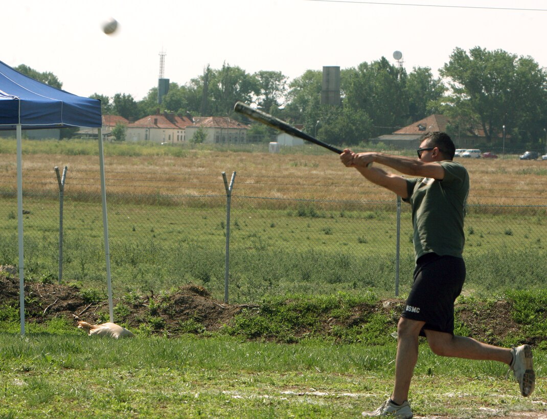 In a tug-o-war between Marines from Black Sea Rotational Force 11 and U.S. Navy stationed here, Marines secure a victory to show who the strongest team is. Marines with Black Sea Rotational Force joined along U.S. Army soldiers, Navy sailors and Air Force airmen to celebrate the Fourth of July with food and festivities such as a dunk tank, sports competitions, pie and watermelon-eating contests and a tug-o-war.