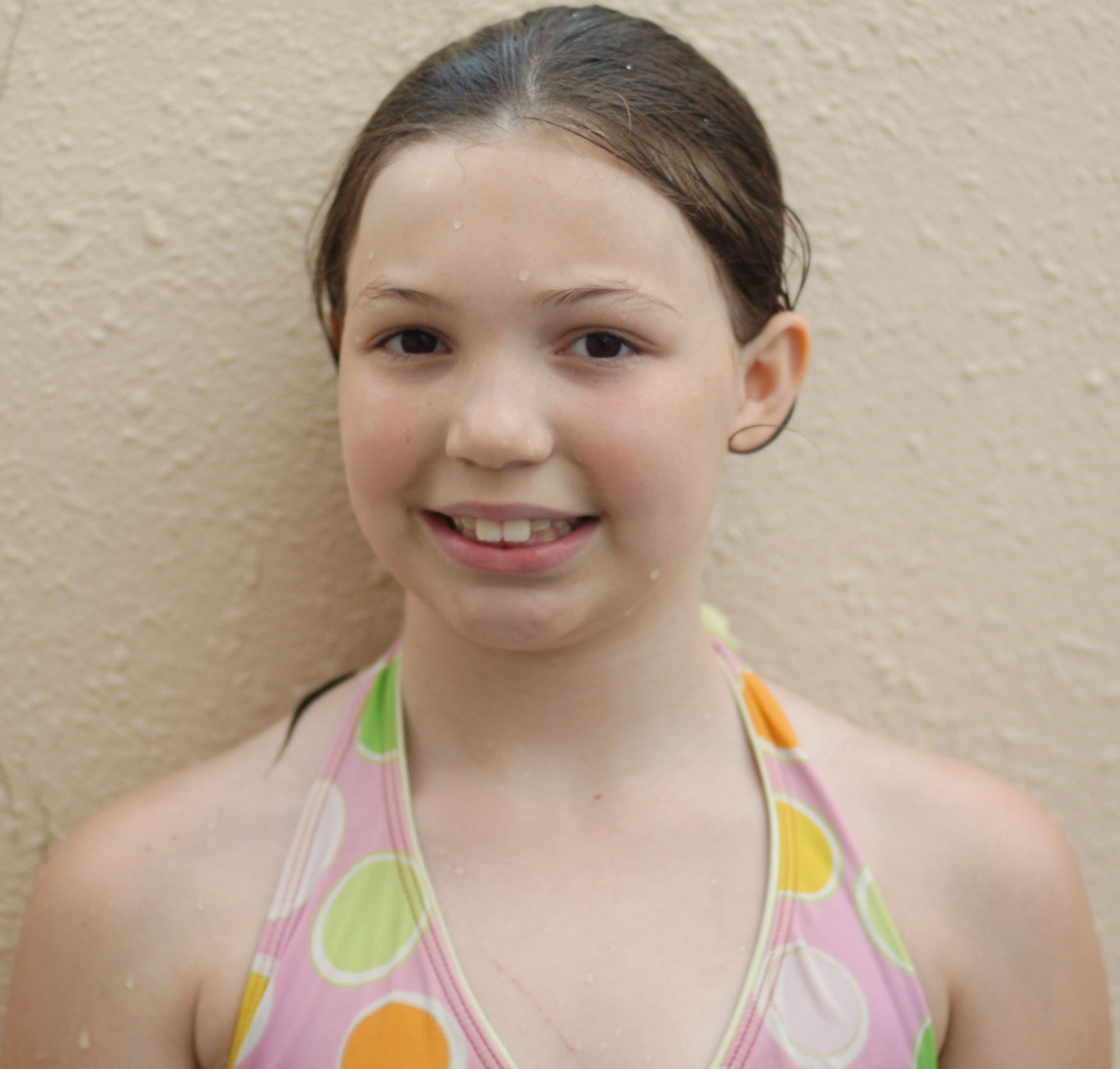 Sade Denny, daughter of Tech. Sgt. Juaacklyn Denny, poses for a picture at the Sakana Pool, Yokota Air Base, Japan, June 29, 2011. For her summer vacation, Sade says, "I plan on hanging out at the pool and being an assistant for summer school." (U.S. Air Force photo/ Airman 1st Class Lynsie Nichols)