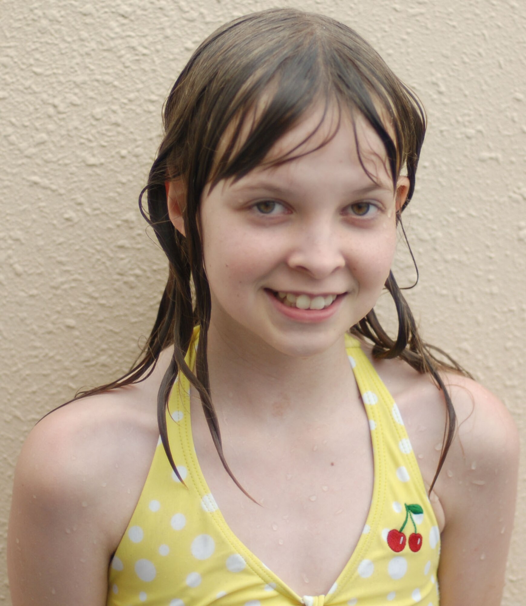 Erin Otto, daughter of Master Sgt. Adam Otto, poses for a photo at the Sakana Pool, Yokota Air Base, Japan, June 29, 2011. For her summer vacation, Erin says, "I plan on hanging out with friends and going on bike rides." (U.S. Air Force photo/ Airman 1st Class Lynsie Nichols)