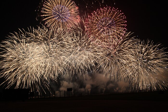 Hundreds of streams of bright fireworks light up the sky for station residents and Japanese locals to enjoy at Penny Lake here Tuesday. Every year, Marine Corps Community Services hosts a fireworks display to celebrate Independence Day, which the U.S. has continued to celebrate for 235 years. Due to heavy rain on Monday, the fireworks display was moved to Tuesday.