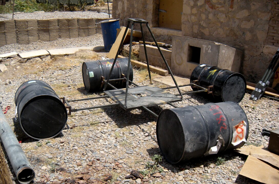 An improvised float system was built as part of a well and water purification project in Kajaki, Afghanistan, Aug. 15, 2011.  Engineers with 7th Engineer Support Battalion, 2nd Marine Logistics Group (Forward), used a combination of military and civilian supplies to complete the 15-day project. (Courtesy Photo)