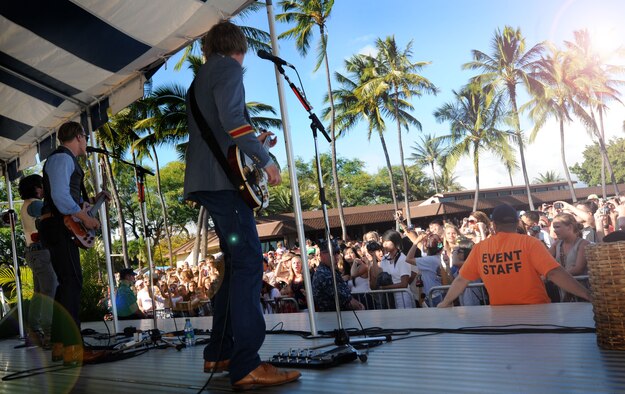 The Plain White T's perform for hundreds of screaming fans at Hickam Harbor on July 4. The festivities, sponsored by MWR, included bouncy houses,  food vendors and a free concert by the Plain White T's.  Hundreds of families and military members camped at the harbor the night before and stayed to enjoy the brilliant display of Fourth of July fireworks that evening. (U.S. Air Force photo/Senior Airman Lauren Main)