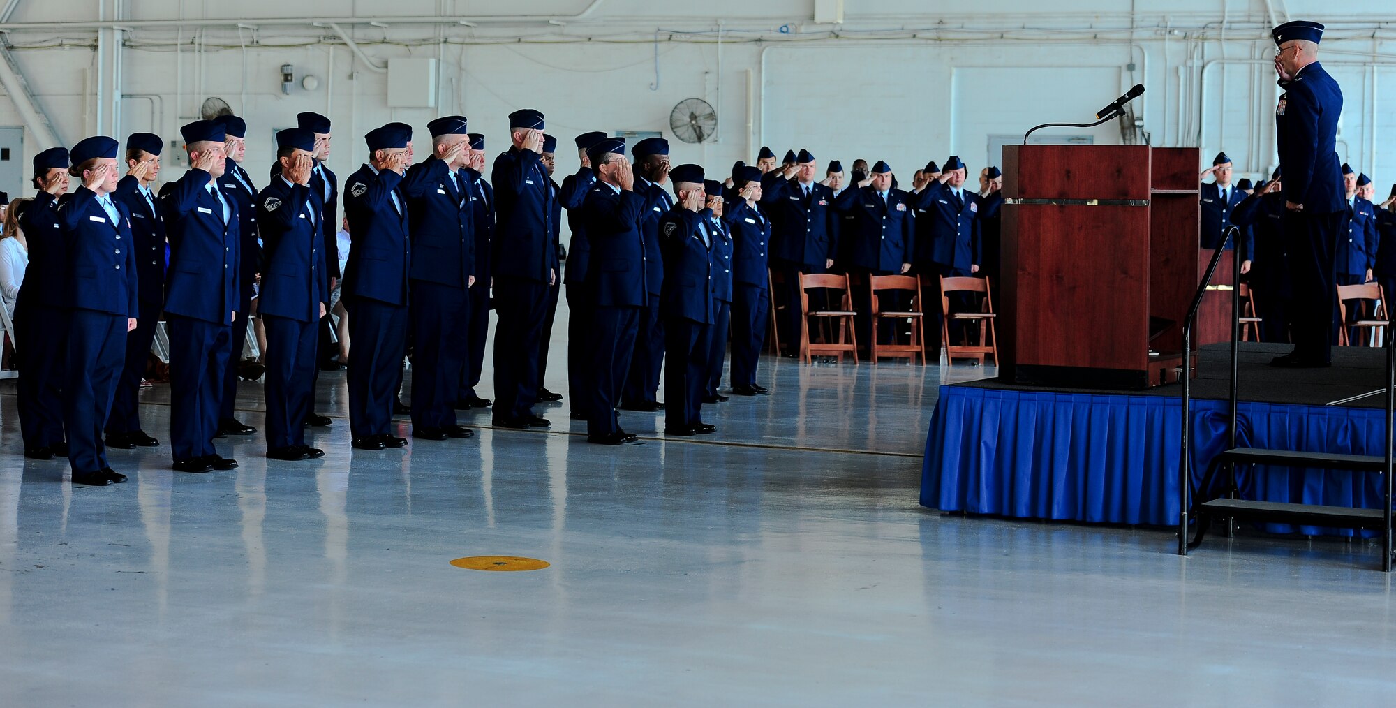 Col. Dennis Beatty, 6th Medical Group commander, receives his first salute from Airmen of the 6th Medical Group  during the 6th Medical Group Change of Command Ceremony July 5, 2011, in Hangar 3 at MacDill Air Force Base, Fla. (U.S. Air Force photo by Airman Basic David Tracy)