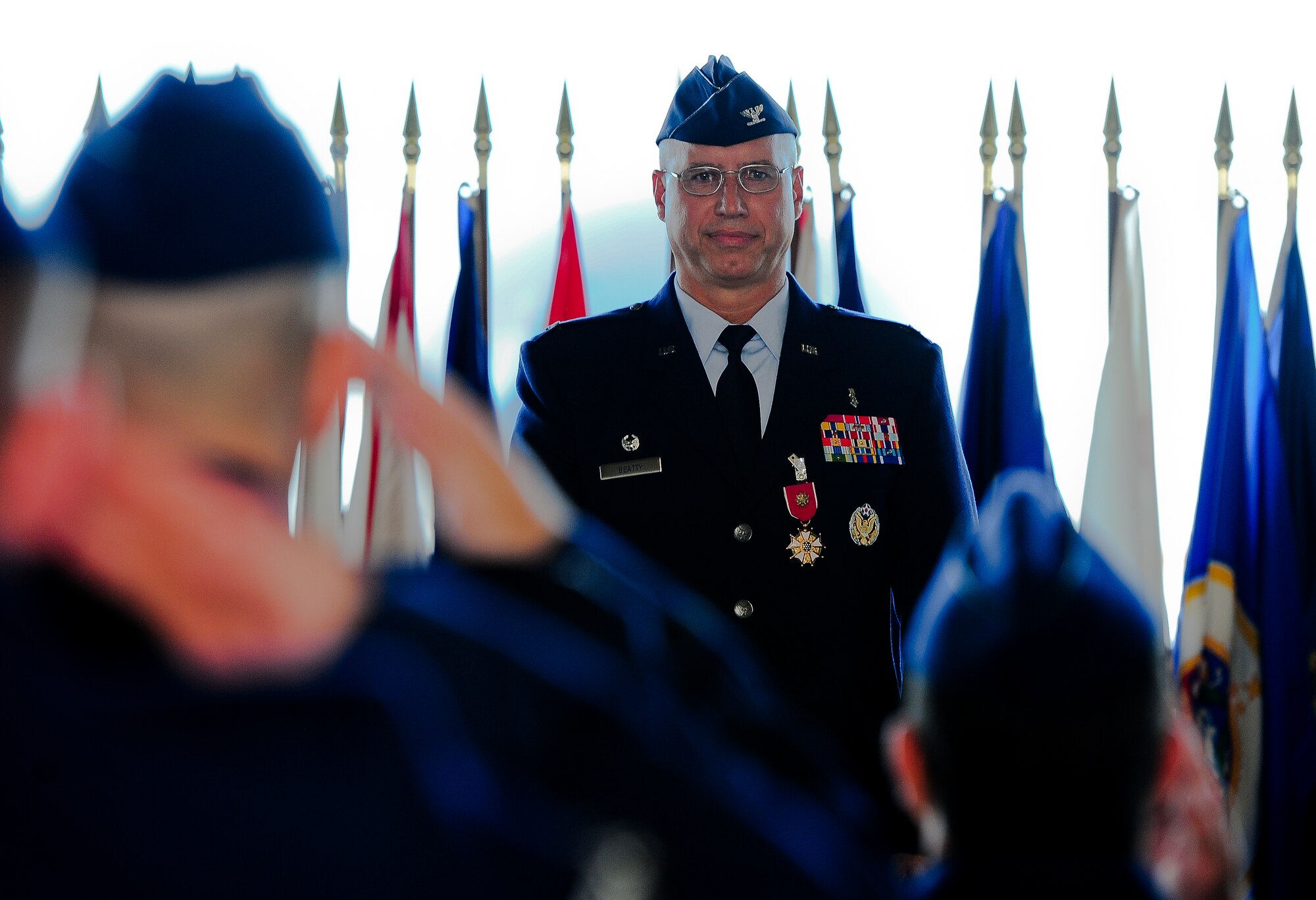 Col. Dennis Beatty, 6th Medical Group commander, receives a final salute from Airmen of the 6th Medical Group during a Change of Command Ceremony July 5, 2011 in Hangar 3 at MacDill Air Force Base, Fla. (U.S. Air Force photo by Airman Basic David Tracy)
