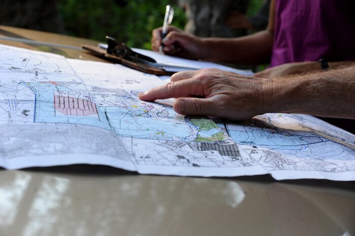 Terrence Larimer pinpoints brick-making locations on a map during a tour at Joint Base Charleston - Weapons Station June 21. Brick making was active on the land that now belongs to the Weapons Station for more than 200 years between the 1600's and 1800's. (U.S. Air Force photo/ Staff Sgt. Nicole Mickle)